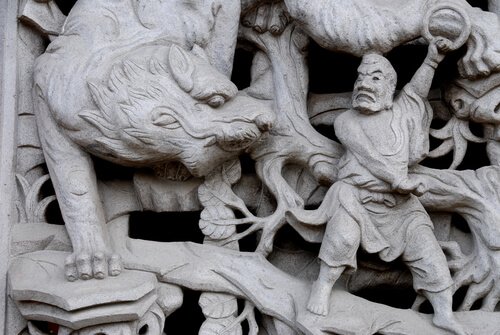 Tigre e uomo in un bassorilievo cinese